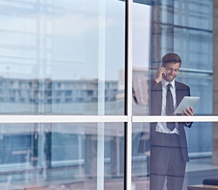 Business man at window