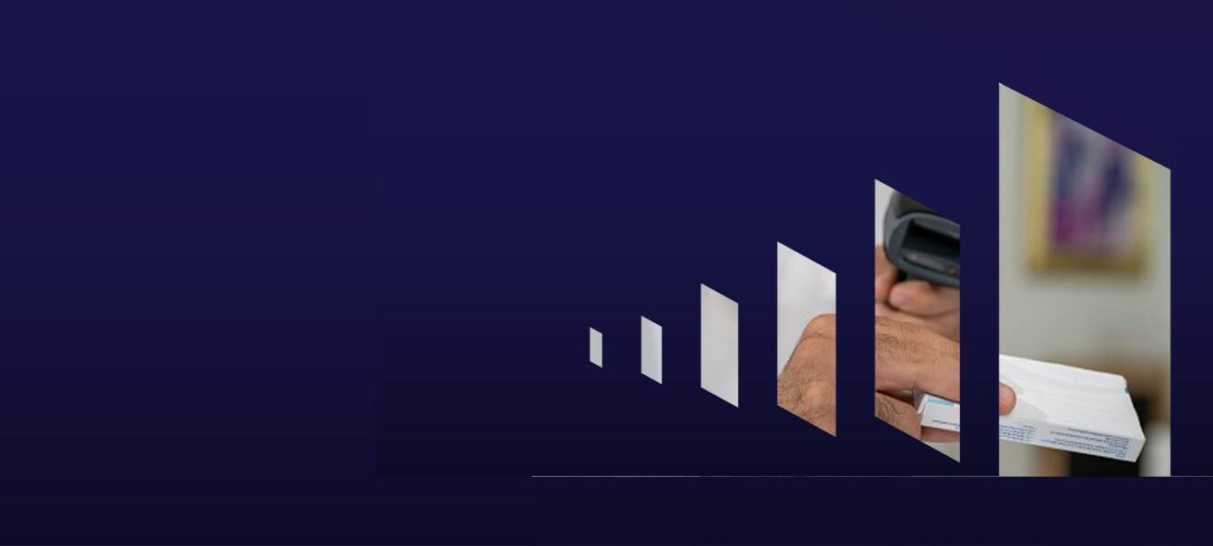 Nurse scanning medication prior to administering it to patient