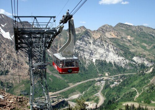 cable car descending from a mountain