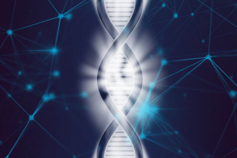 glowing strand of DNA on a blue background