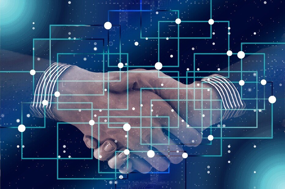 business partners shaking hands under a layer of dots connected to one another