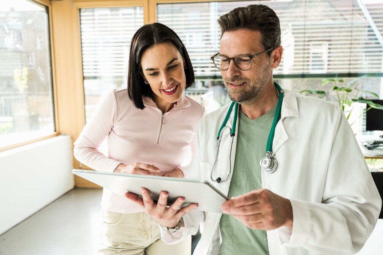 Doctor and patient looking at ipad