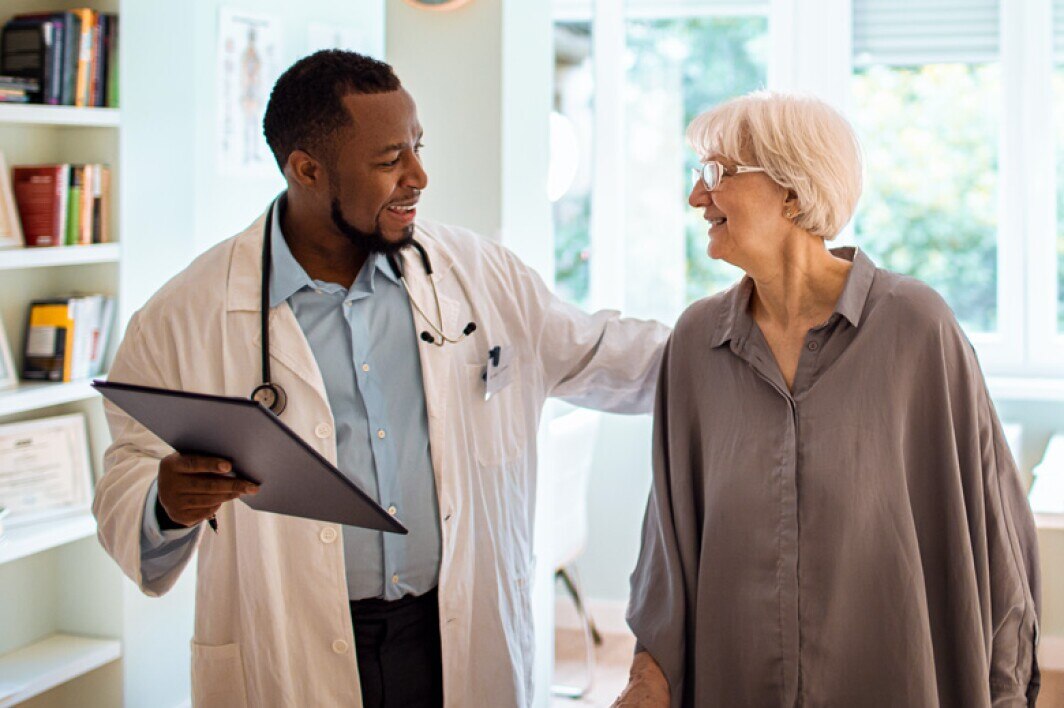 doctor having a conversation with his patient
