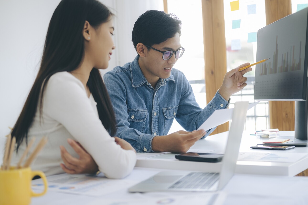 Programmer and Developer coding software application.