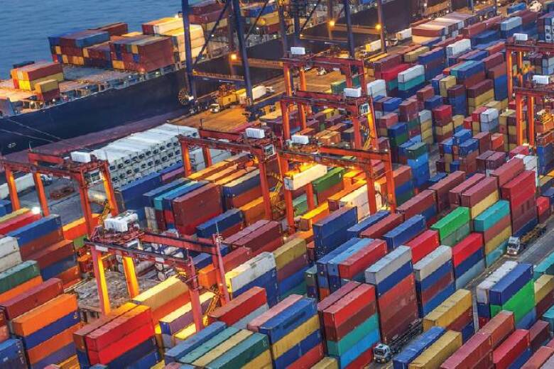 shipping dock packed with colorful shipping containers