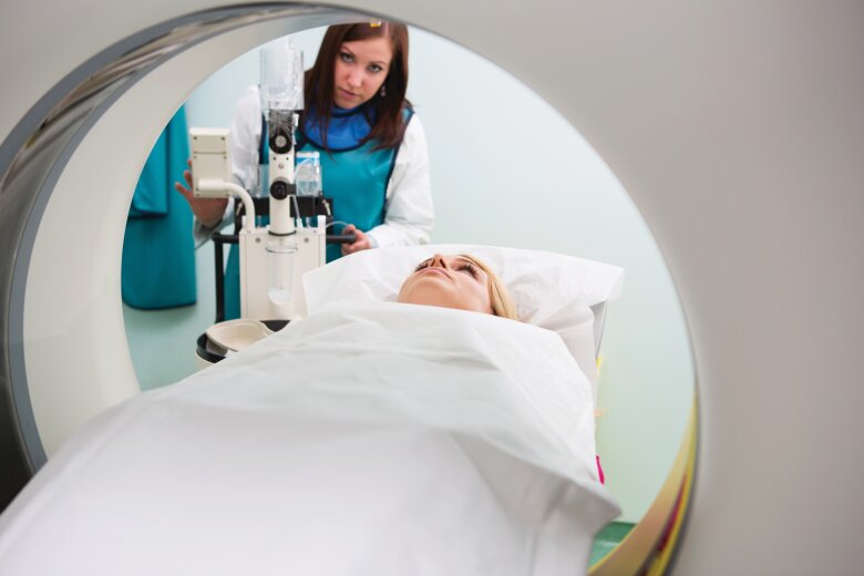 Young woman waiting to have a CAT scan