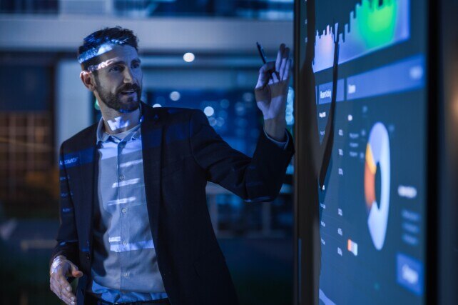 businessman showing data for a presentation