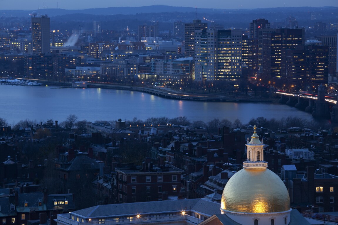 High angle view of Massachusetts State House, Cambridge riverfront, Charles River, and Longfellow Bridge