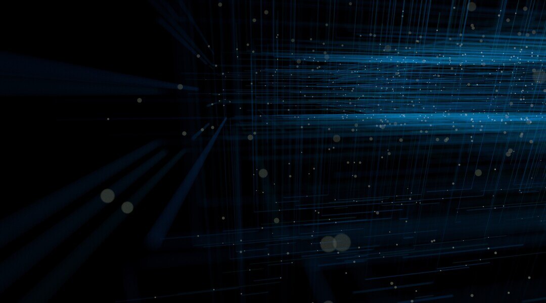 abstract image of teal light on dark background