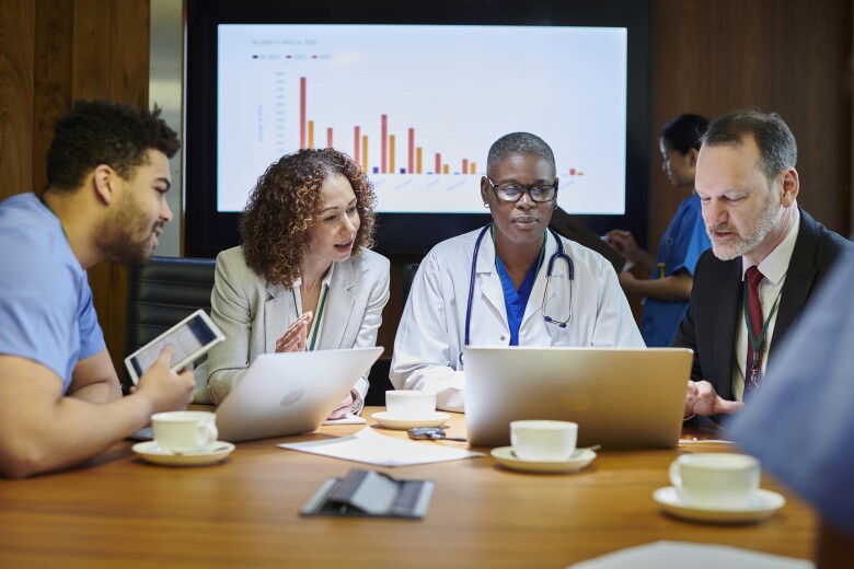 Healthcare doctor nurse in business meeting