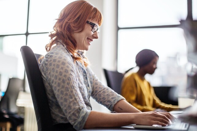 woman working at her desk in an office