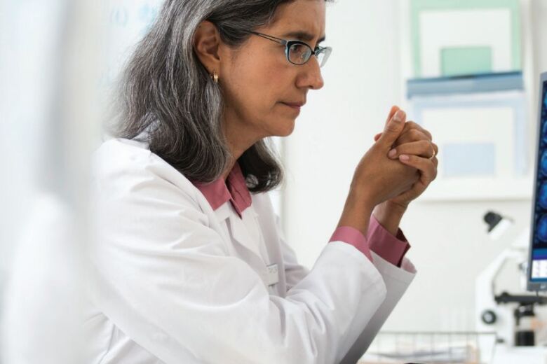 doctor looking at medical scans