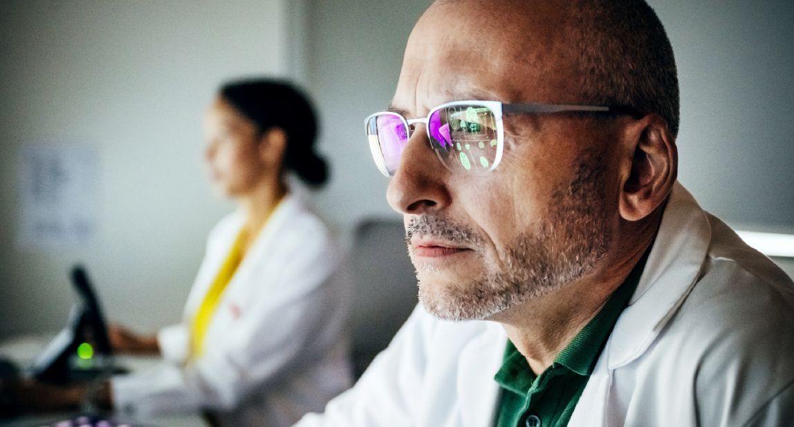 Doctor wearing classes close up