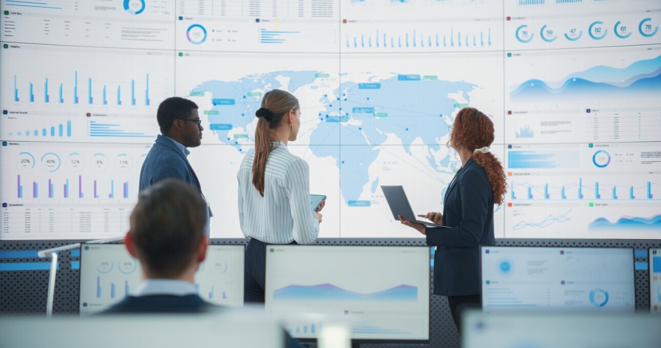 meeting in front of video wall