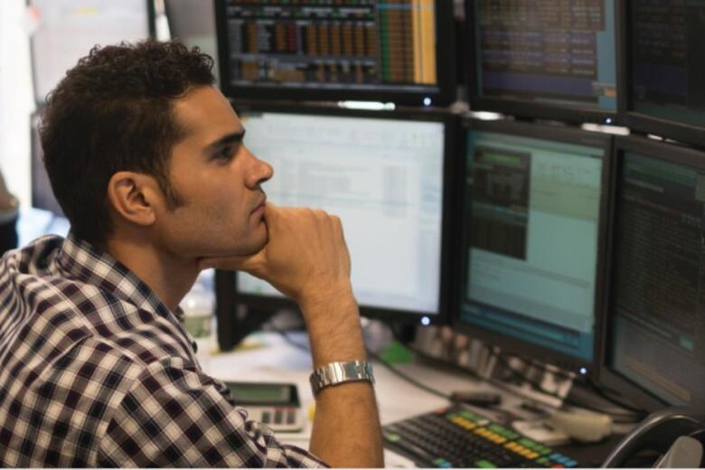 developer reviewing information on the computer