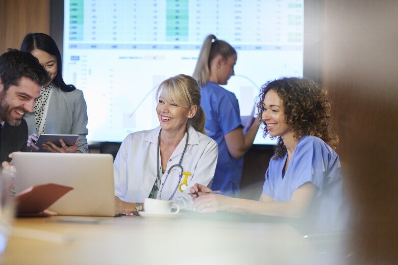 happy medical team meeting
