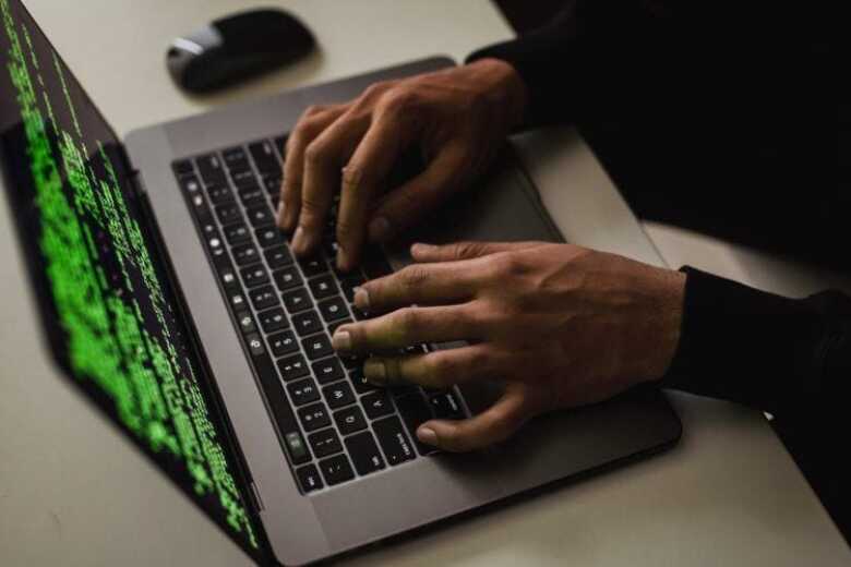 hands on a computer keyboard