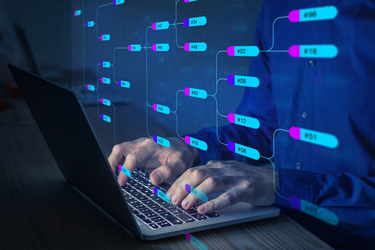 Programming and designing software architecture with node tree. Abstract technology concept with person UML Unified Modeling Language on computer. Data relationship visualization.
