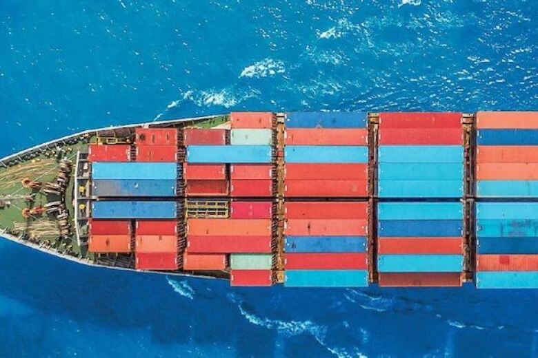 birds eye view of a container ship on the ocean
