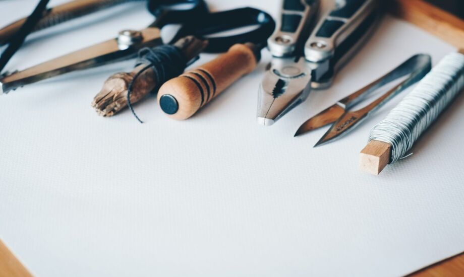 tools lined up on a desk 