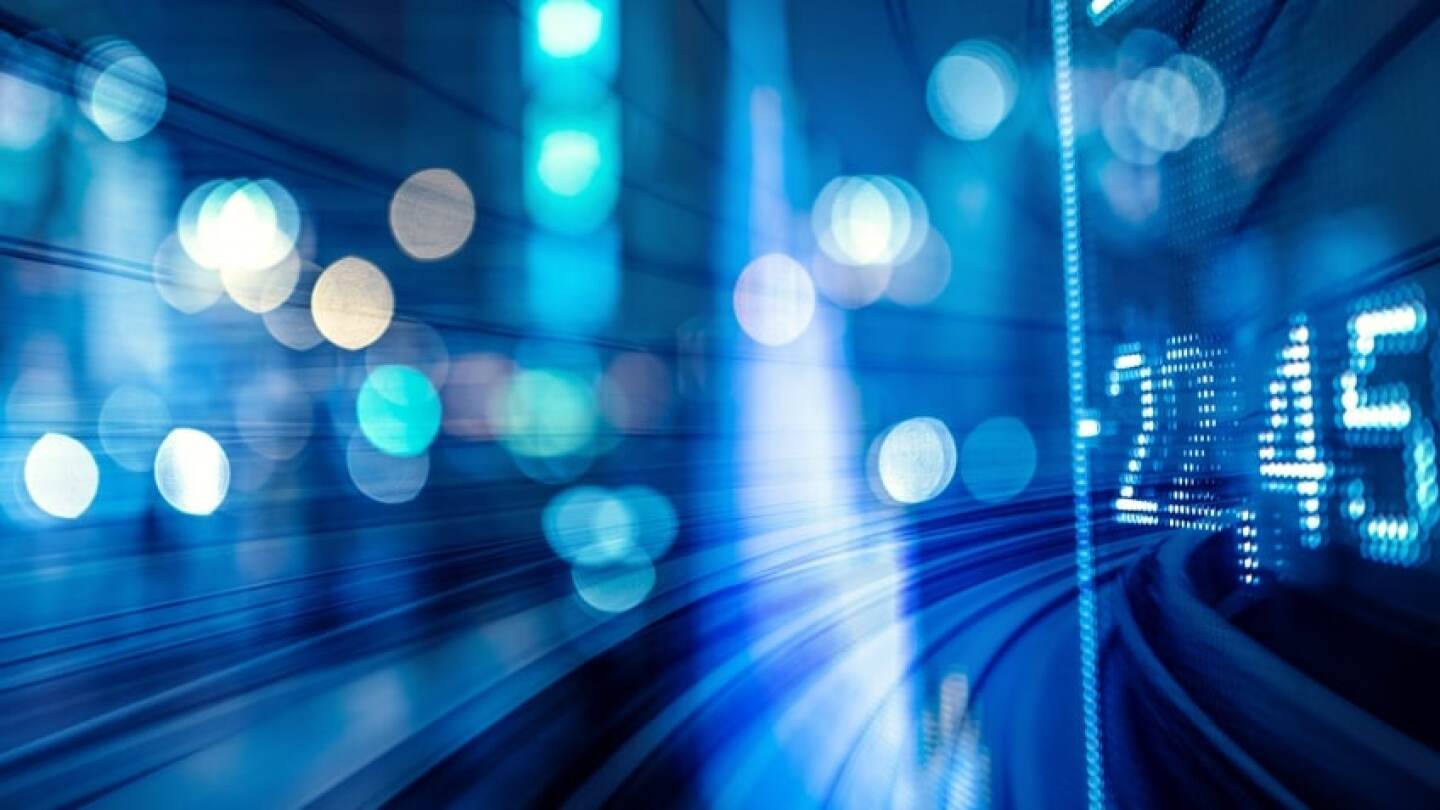 blurred background with light spots and financial data