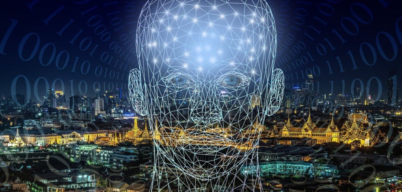 artificial intelligence graphic of a human head and binary number system superimposed over an urban landscape at night