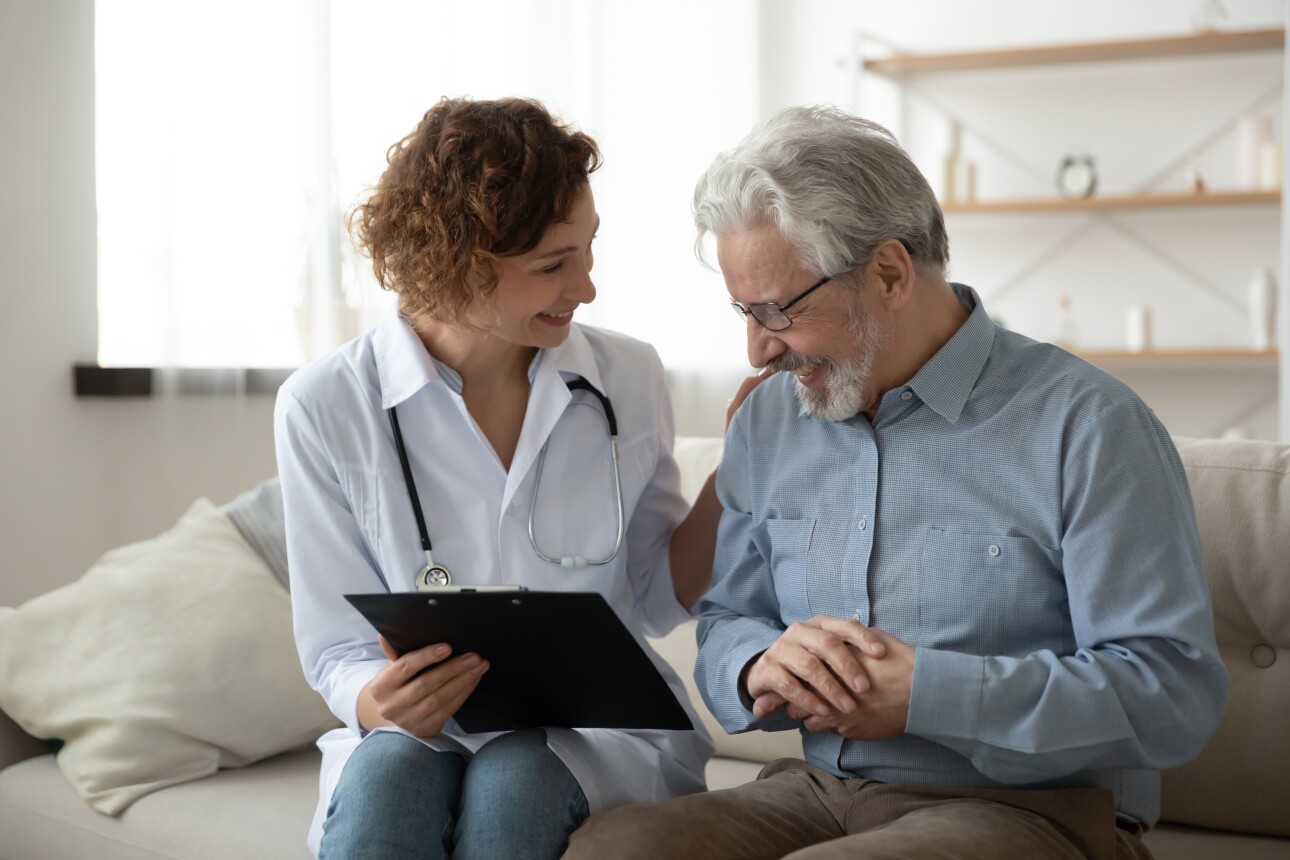 Happy Clinician with Older Patient