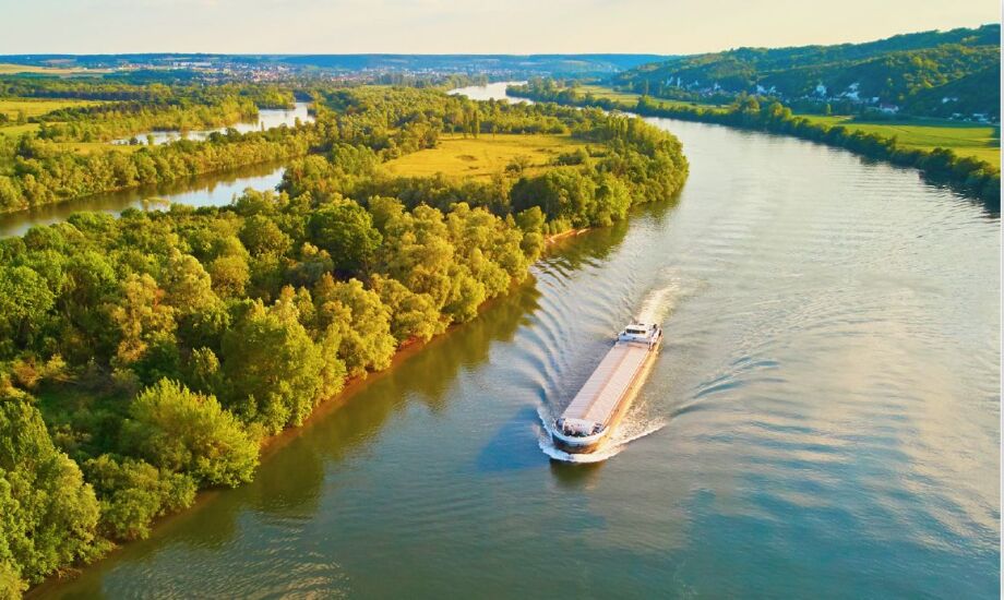boat cruising down a river
