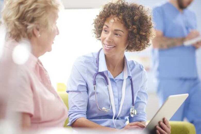 Woman doctor and woman patient