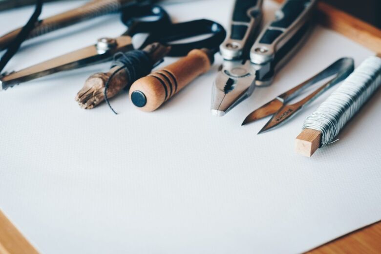 tools lined up on a desk 