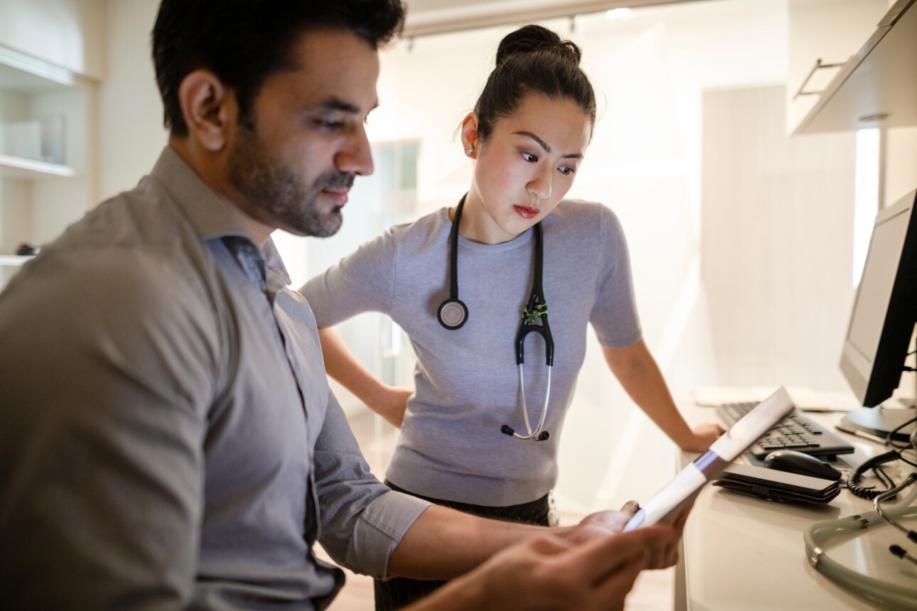 doctors looking at ipad