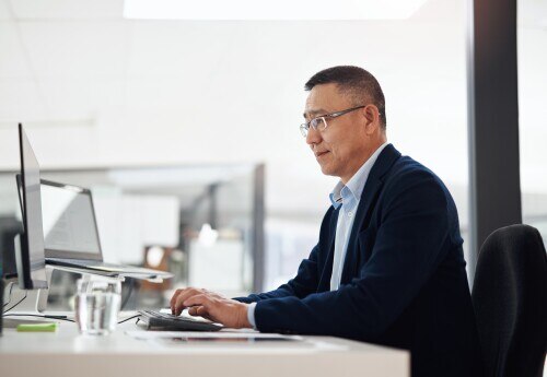 Chief Technology Officer working at his desk