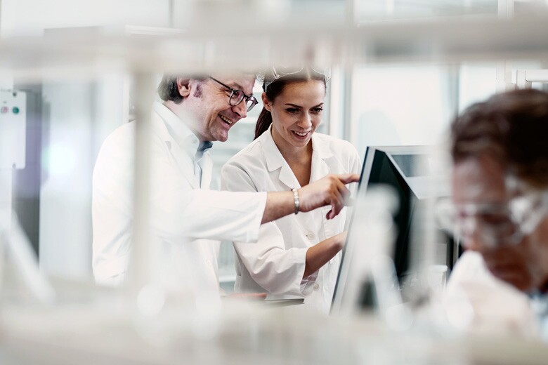people collaborating in a lab