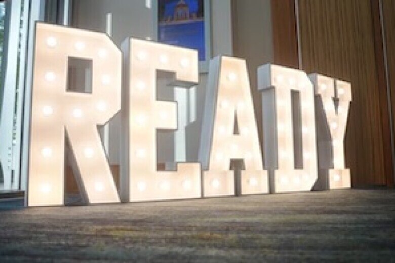 READY spelled out in letters on floor