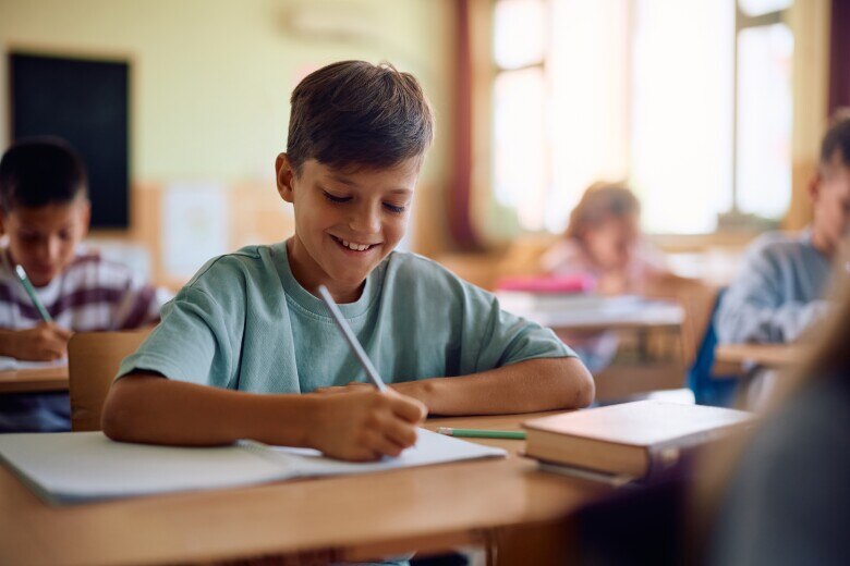 School boy at desk