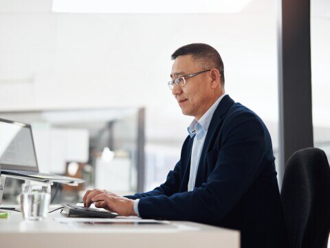 Chief Technology Officer working at his desk