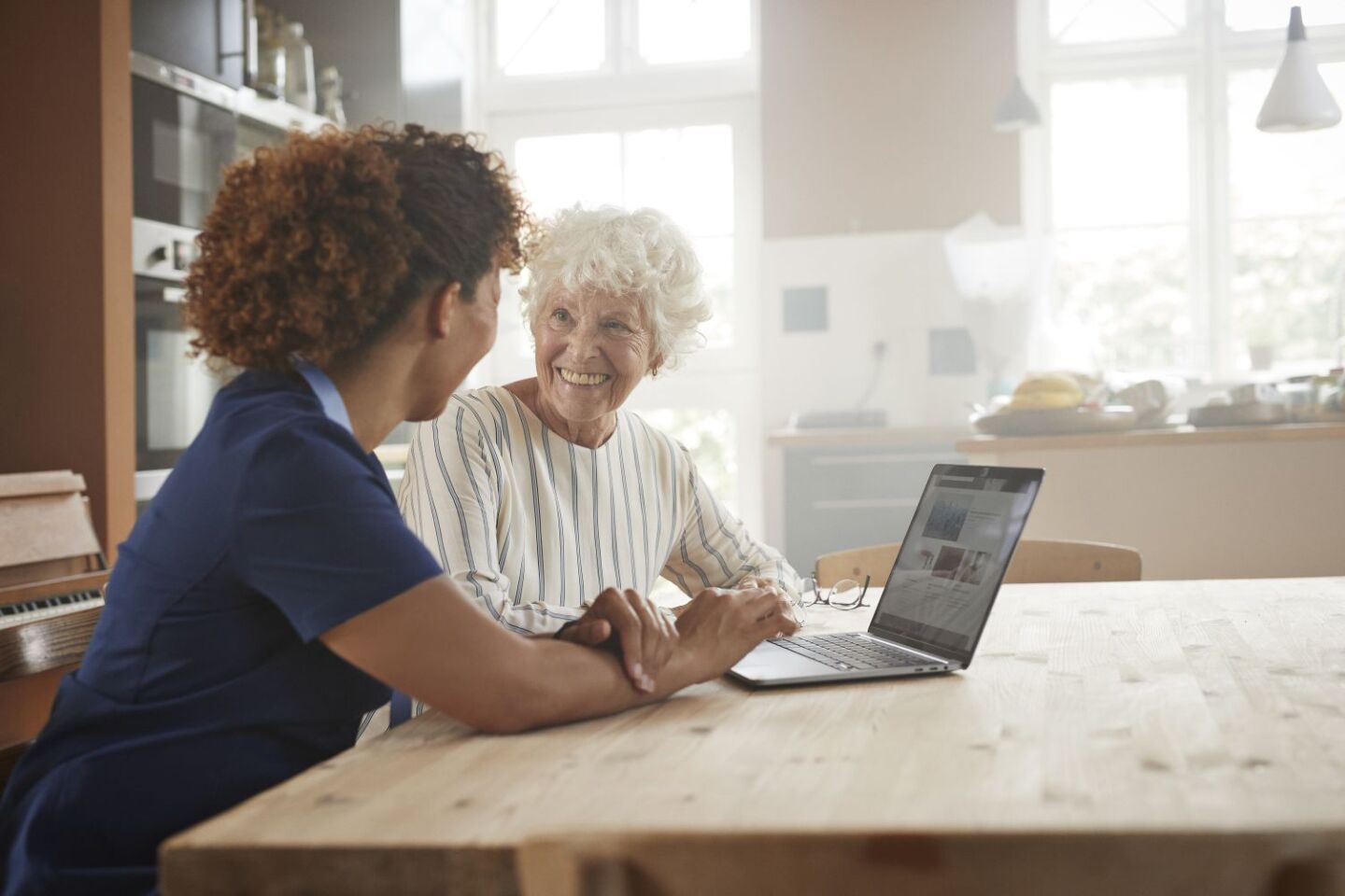 home nurse and women healthcare laptop