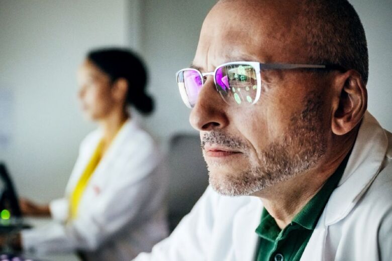 Doctor wearing classes close up