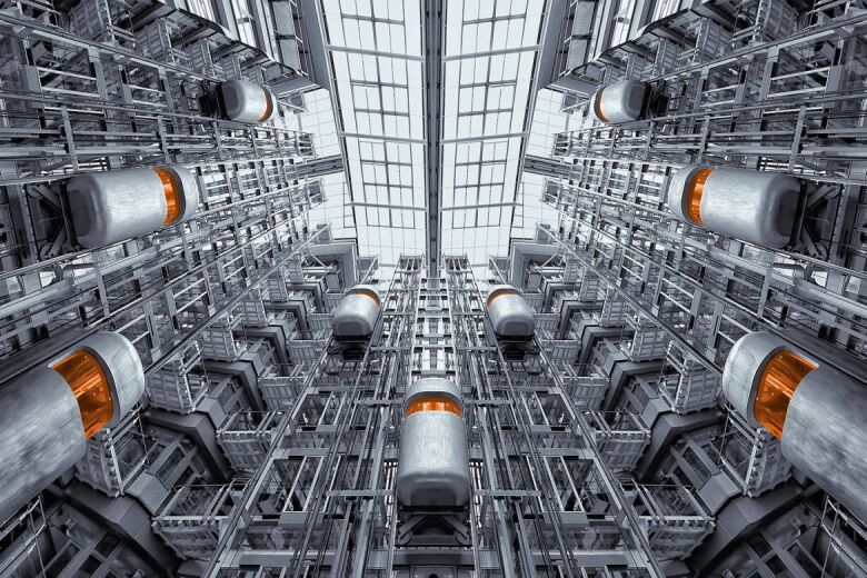 futuristic elevators in various states of ascent