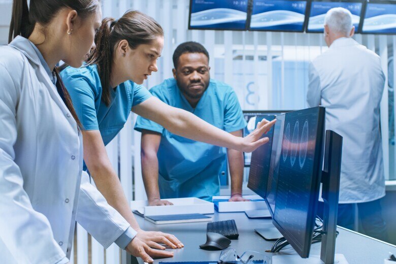 Team of Doctors reviewing Data